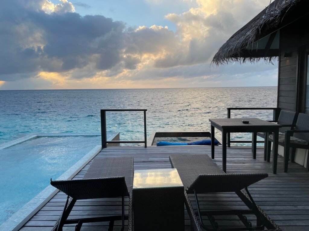 The terrace and infinity pool at the beachfront resort